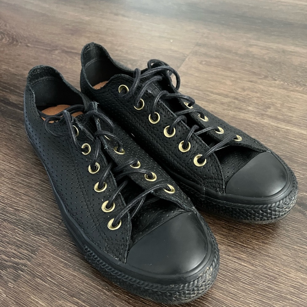 Converse black perforated sneakers size 7 men, size 9 women